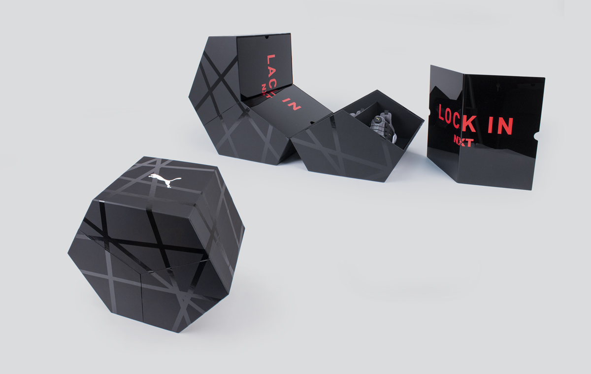 PUMA golf influencer kit showing hexagonal box with custom matte black branded printing