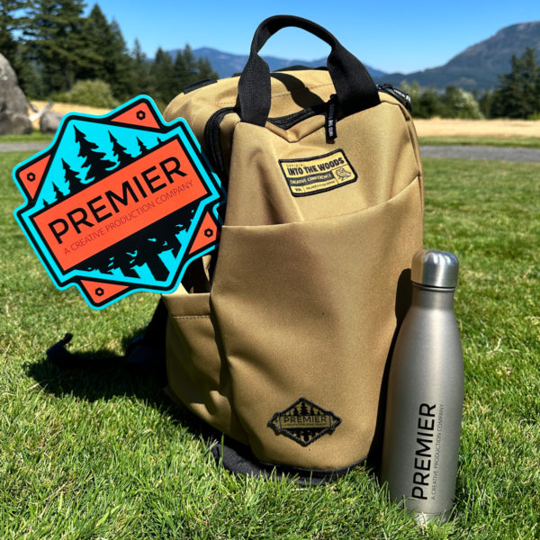 Into The Woods Conference Signage and Backpacks Ready for Adventure