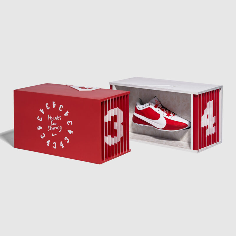 A Lenticular Display Case Showcasing the Nike Giannis Freak 5 ASW Shoes