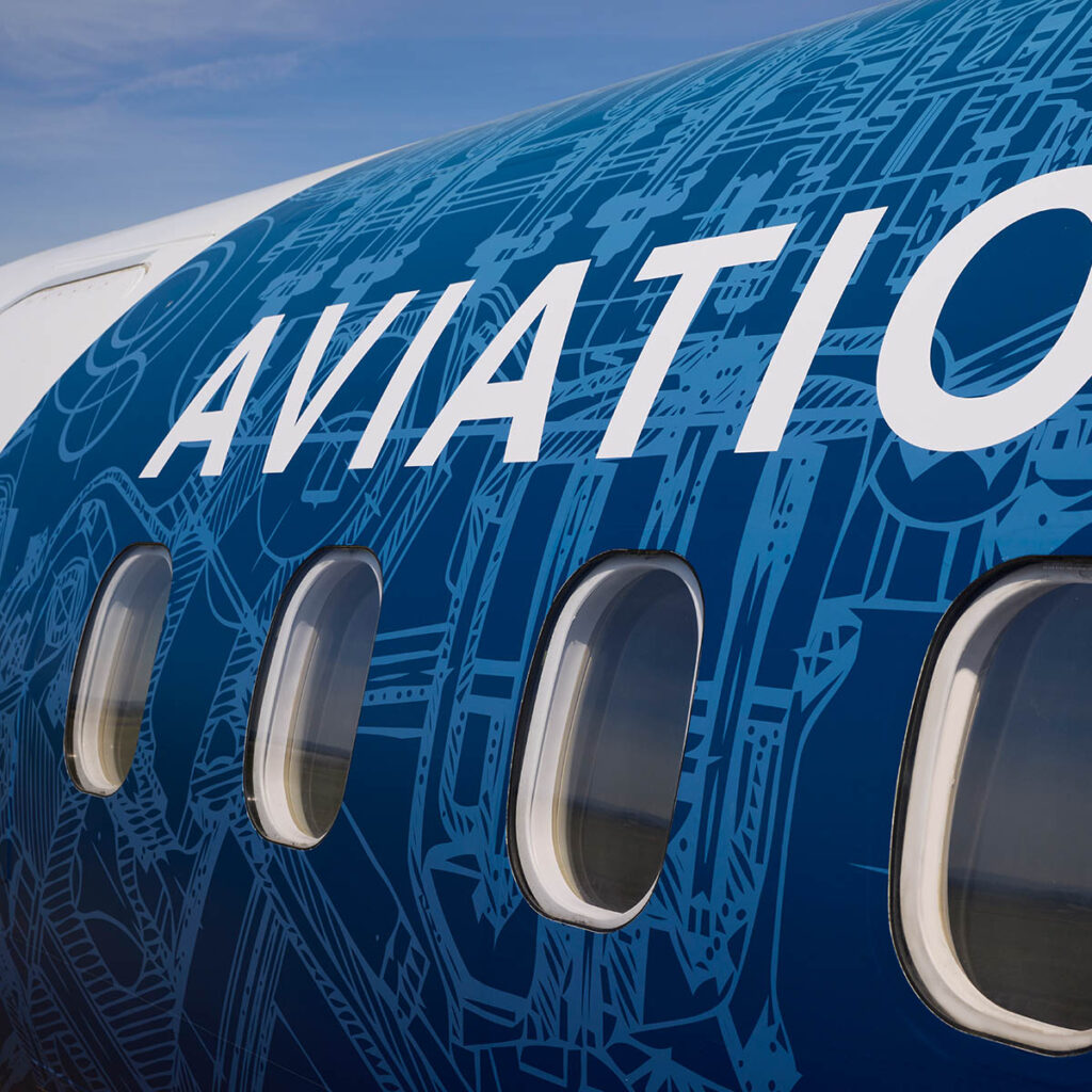 Detail of the vinyl wrapping around the windows of Portland Community College’s training aircraft.