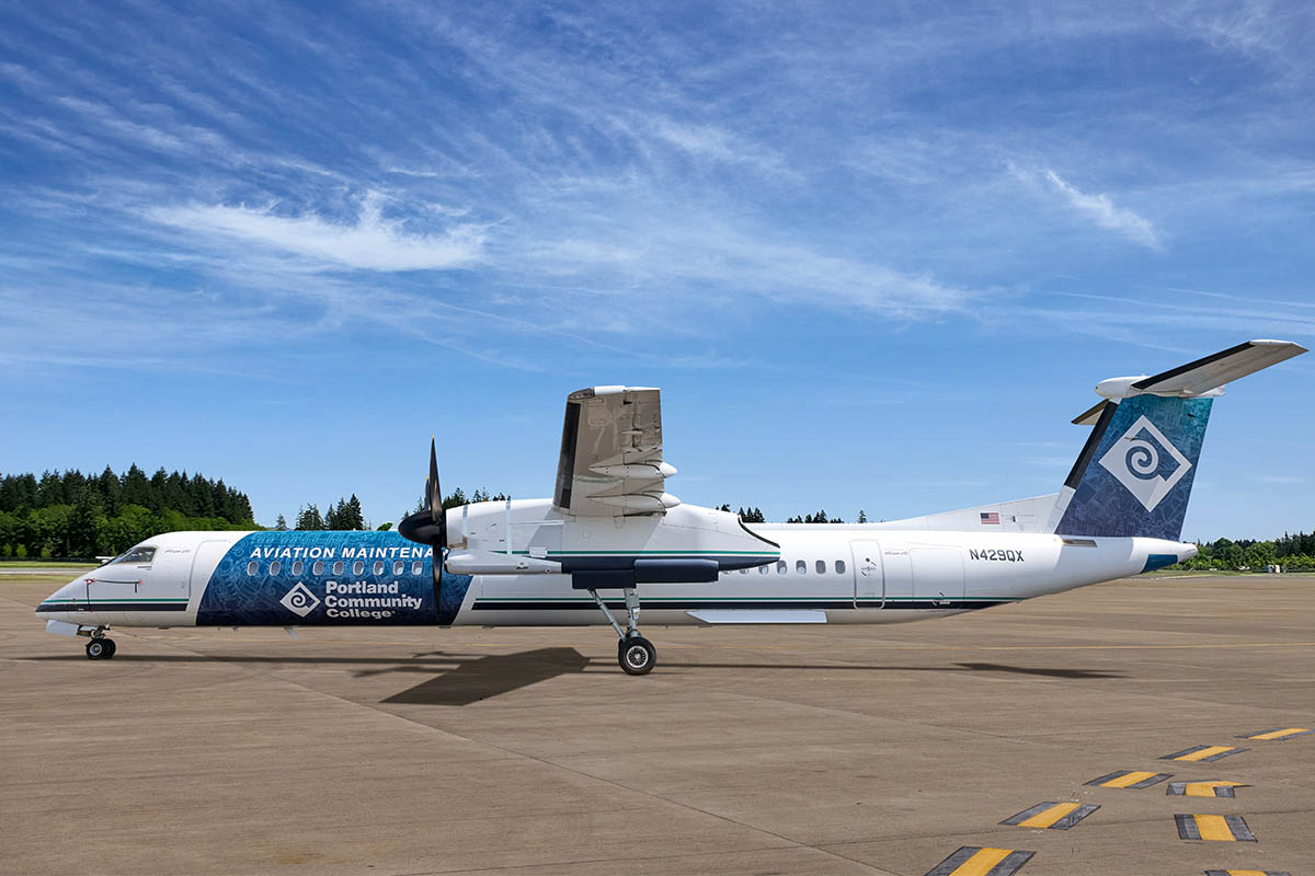 Portland Community College’s vinyl wrapped aircraft featuring a blueprint design.