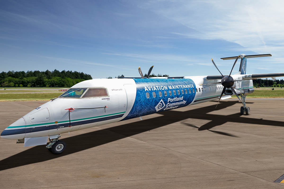 Portland Community College’s vinyl wrapped aircraft featuring a blueprint design.