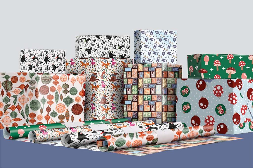 2022 wrapping paper shown as rolls and wrapped boxes