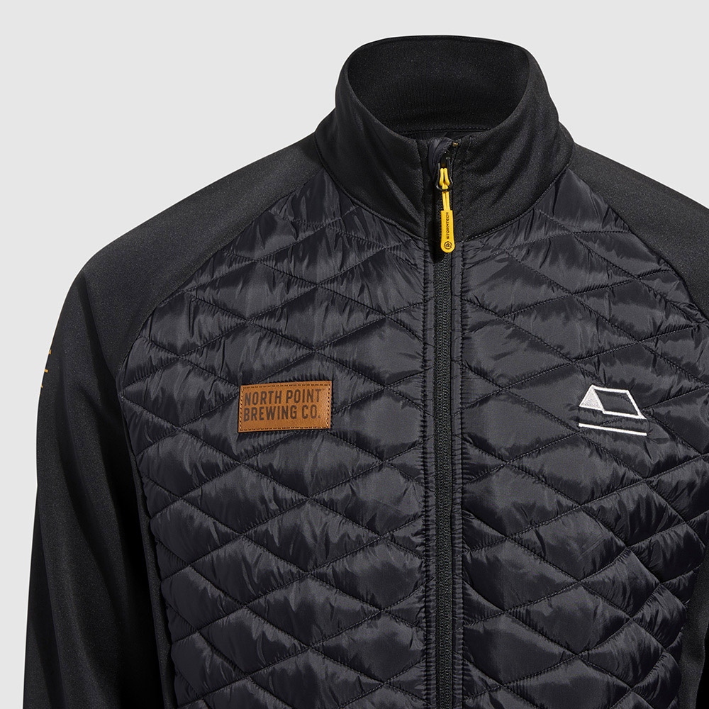 Quilted jacket with custom branded embroidery and patch