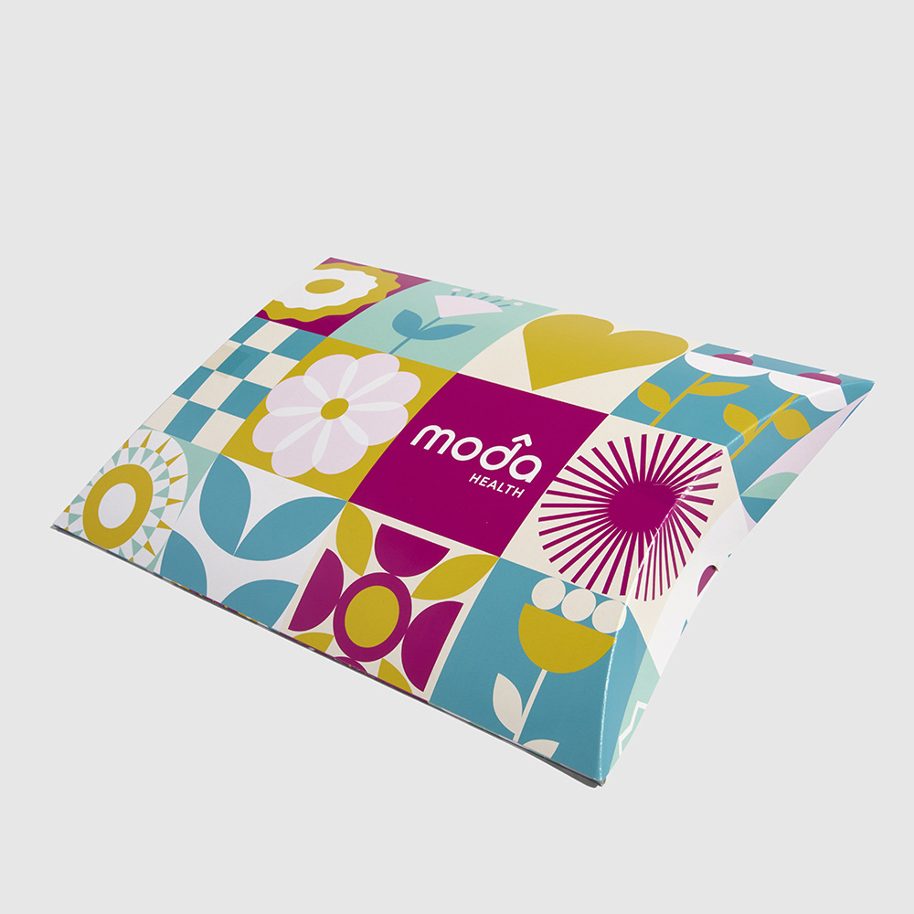 Colorful patterned mailer from Moda Health