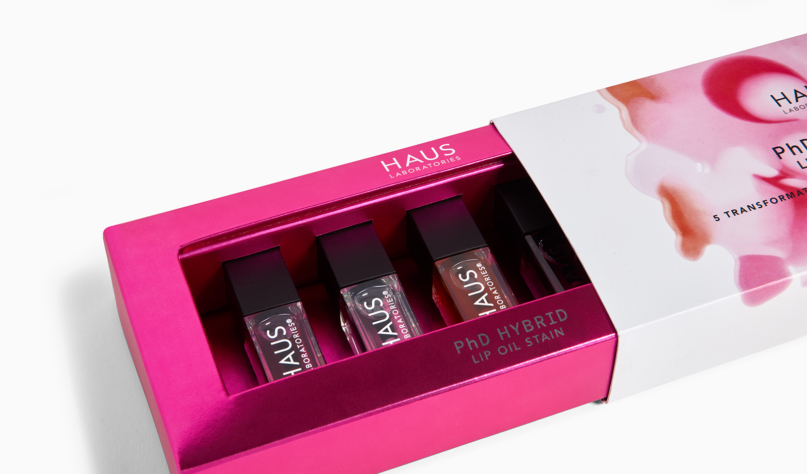 Haus Lip Stain Packing detail showing inside bottles and pink slide out case