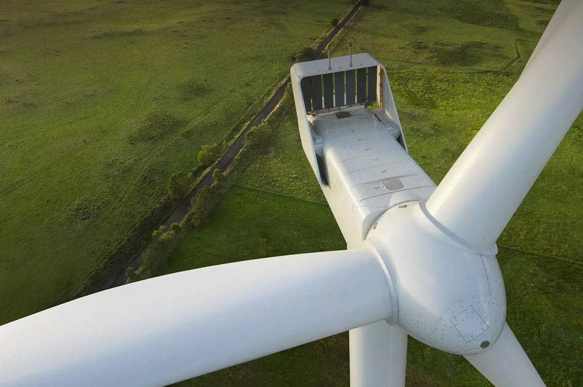 Vestas wind turbine over grassy green Oregon hills